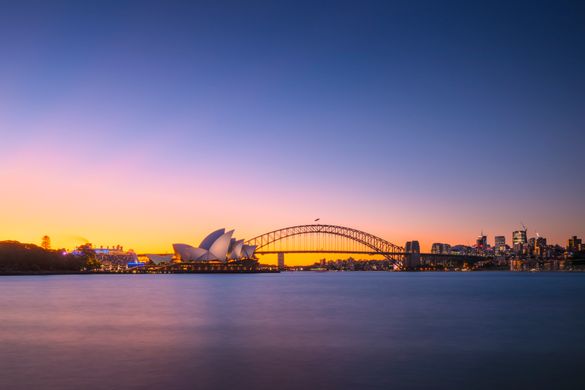 Sun setting over the Sydney Opera House and the Sydney Harbour Bridge, Sydney Sun setting over the Sydney Opera House and the Sydney Harbour Bridge, Sydney