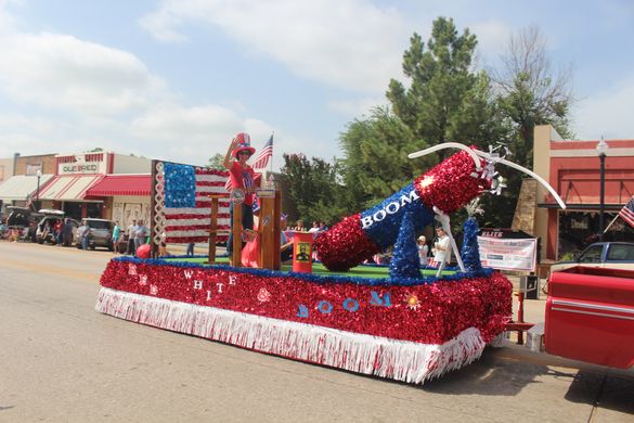 The Red, White & Boom Celebration Parade rolls through downtown Tishomingo, Oklahoma. The Red, White & Boom Celebration Parade rolls through downtown Tishomingo, Oklahoma.