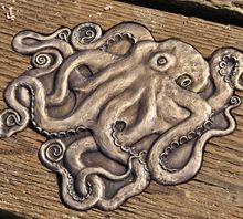 A Bronze Relief on the Capitola Wharf