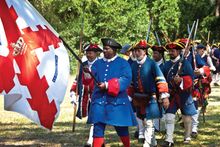 Living historians represent the free Black Fort Mose militia, Spanish militia, and Native American allies battle the British and Scottish invaders at the Battle of Bloody Mose, a reenactment of the battle that took place on June 26, 1740. 